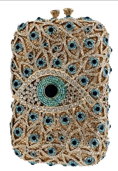 Crocheted phone case with a detailed eye design in blue and beige yarn.