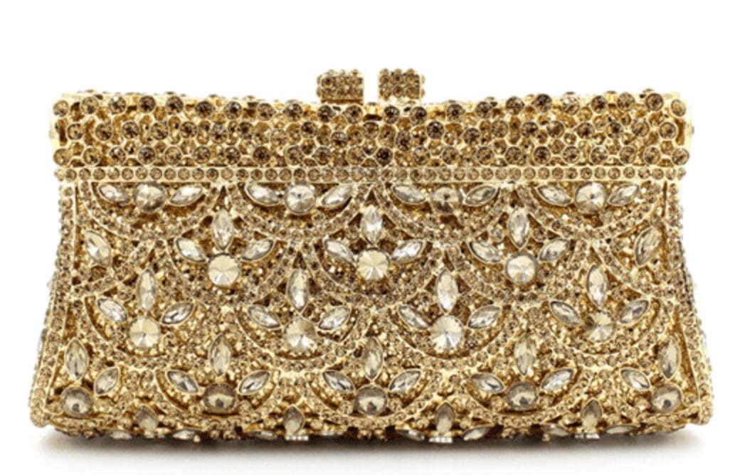 Ornate gold clutch adorned with pearls and intricate beadwork.