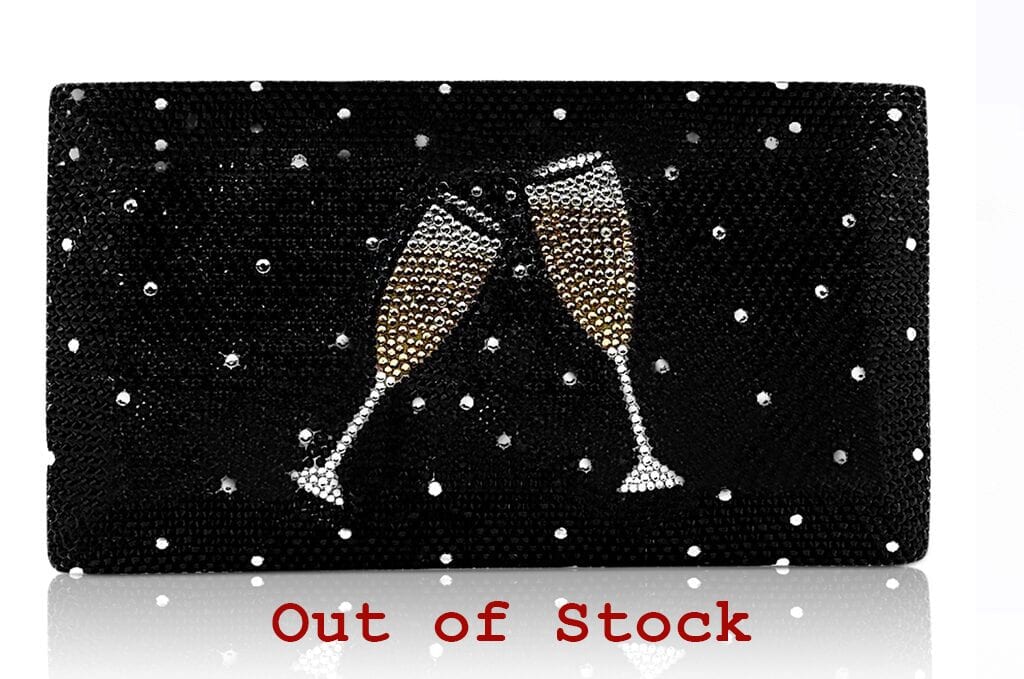 Two champagne glasses clinking against a starry black background.