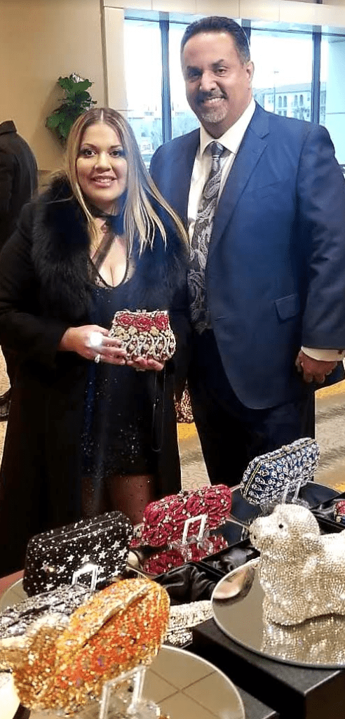 couple holding Swarovski crystal purse