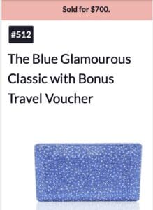 Blue Glamourous Classic clutch with bonus travel voucher.