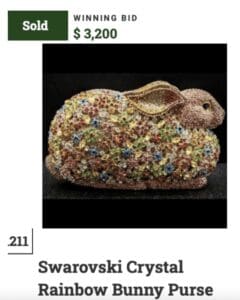 A rabbit sculpture encrusted with colorful Swarovski crystals.