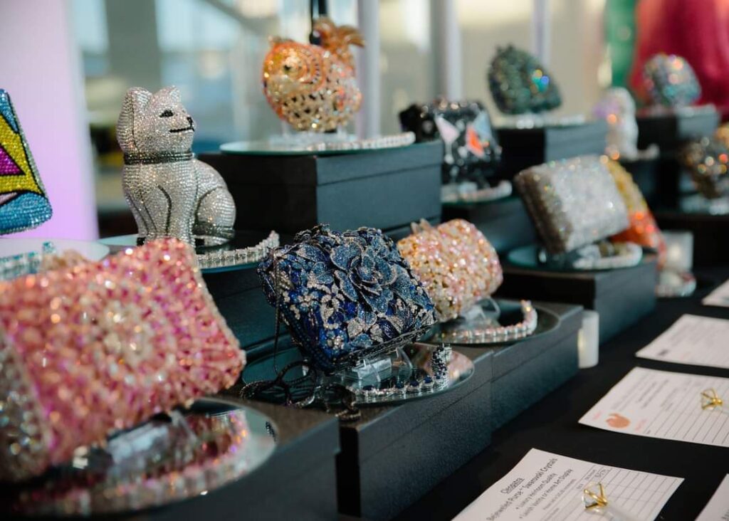 table with Swarovski crystal purses on display 2