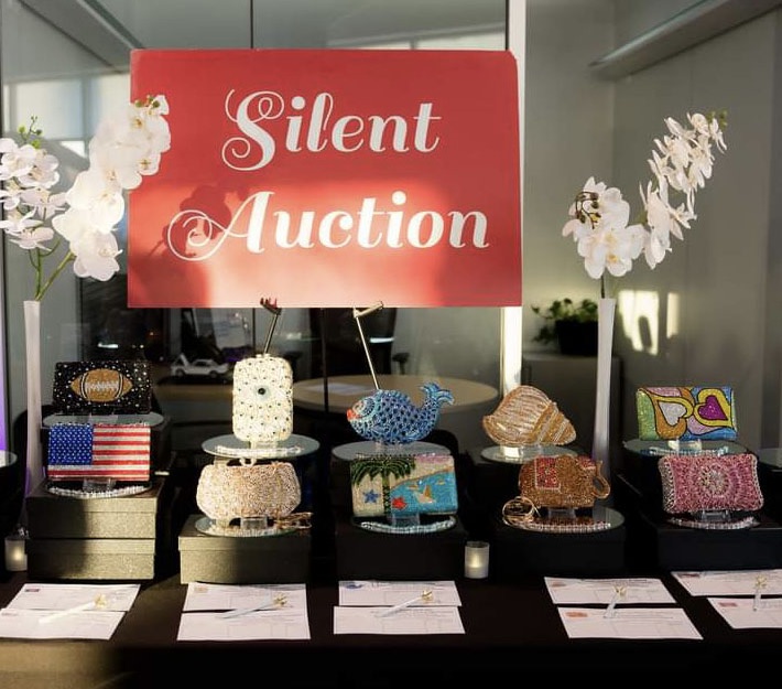 silent auction display with purses