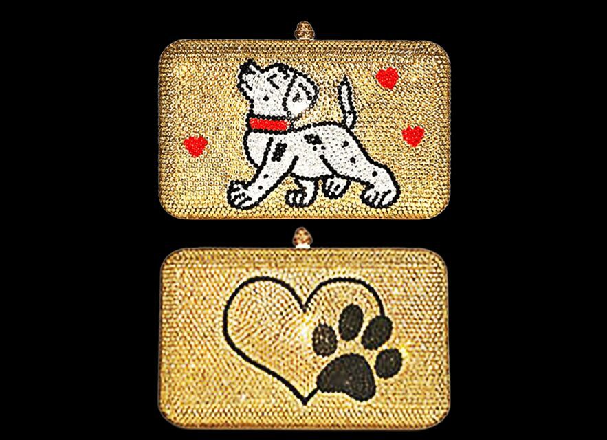 Two golden patches, one with a Dalmatian puppy and one with a heart and paw print.