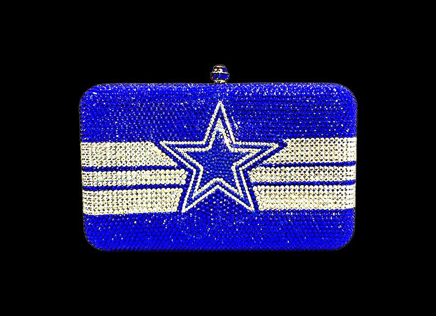A blue clutch purse with a Dallas Cowboys star logo and white stripes.